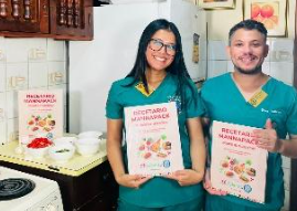Student volunteers with recipe books